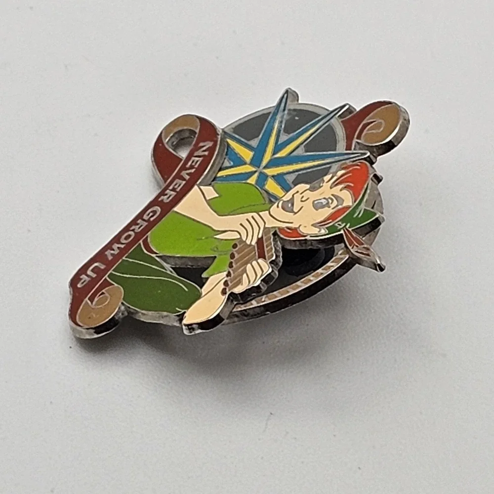 Disney Peter Pan with Pan Pipes & Compass Never Grow Up Trader Pin
